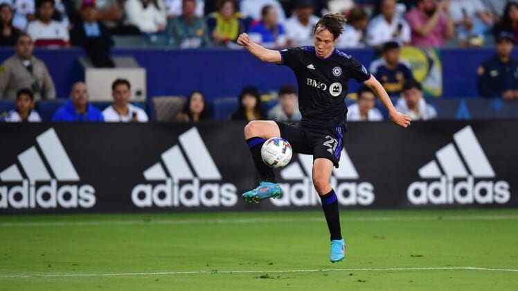 Jul 4, 2022; Carson, California, USA; CF Montreal midfielder Lassi Lappalainen (21) controls the ball against Los Angeles Galaxy during the first half at Dignity Health Sports Park. Mandatory Credit: Gary A. Vasquez-USA TODAY Sports