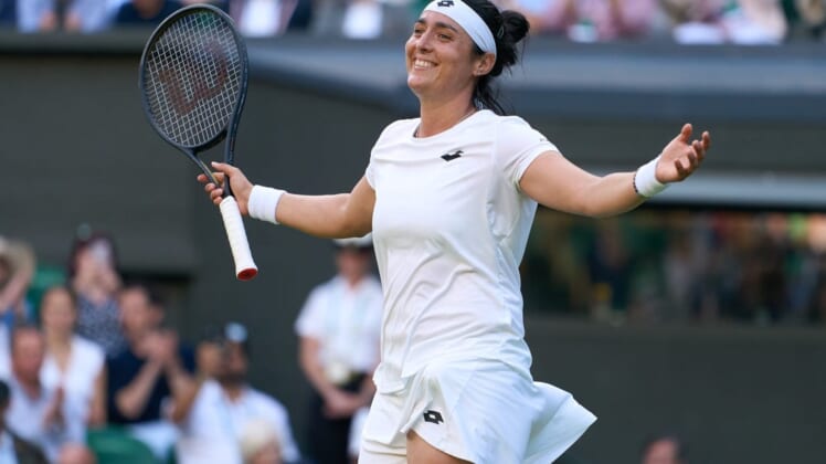 Jul 5, 2022; London, England, United Kingdom; Ons Jabeur (TUN) celebrates after match point in a quarterfinals womens singles match against Mane Bouzkova (CZE) on Centre court at the 2022 Wimbledon Championships at All England Lawn Tennis and Croquet Club. Mandatory Credit: Peter van den Berg-USA TODAY Sports