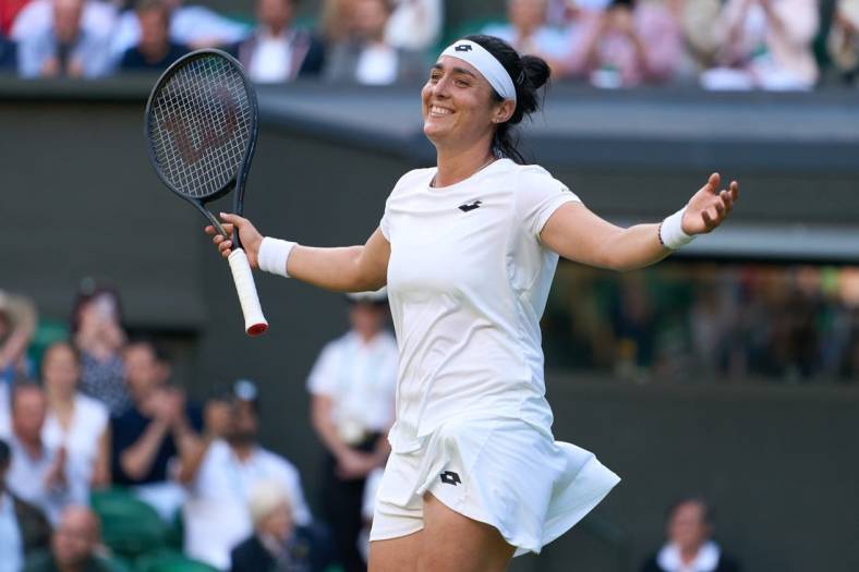 Jul 5, 2022; London, England, United Kingdom; Ons Jabeur (TUN) celebrates after match point in a quarterfinals womens singles match against Mane Bouzkova (CZE) on Centre court at the 2022 Wimbledon Championships at All England Lawn Tennis and Croquet Club. Mandatory Credit: Peter van den Berg-USA TODAY Sports