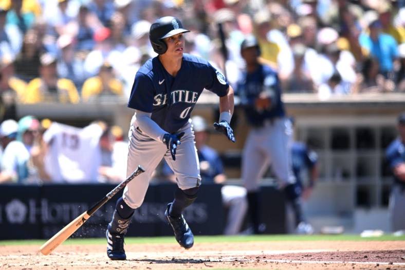 Jul 5, 2022; San Diego, California, USA; Seattle Mariners left fielder Sam Haggerty (0) hits a home run during the third inning against the San Diego Padres at Petco Park. Mandatory Credit: Orlando Ramirez-USA TODAY Sports
