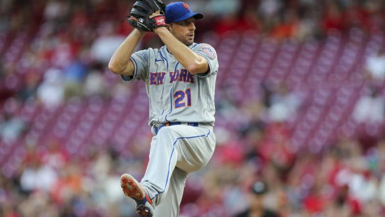 Jul 5, 2022; Cincinnati, Ohio, USA; New York Mets starting pitcher Max Scherzer (21) pitches during the second inning against the Cincinnati Reds at Great American Ball Park. Mandatory Credit: Katie Stratman-USA TODAY Sports