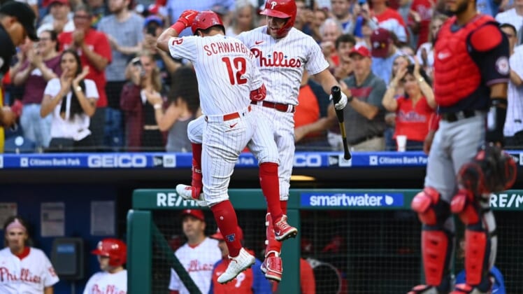 Jul 5, 2022; Philadelphia, Pennsylvania, USA; Philadelphia Phillies outfielder Kyle Schwarber (12) celebrates with first baseman Rhys Hoskins (17) after hitting a home run against the Washington Nationals in the third inning at Citizens Bank Park. Mandatory Credit: Kyle Ross-USA TODAY Sports