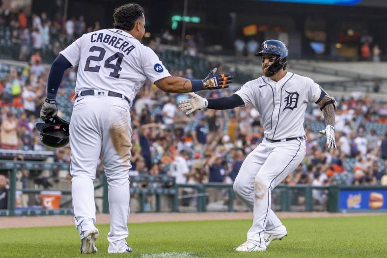 Jul 5, 2022; Detroit, Michigan, USA; Detroit Tigers catcher Eric Haase (right) celebrates with designated hitter Miguel Cabrera (24) after hitting a two run home run during the fourth inning against the Cleveland Guardians at Comerica Park. Mandatory Credit: Raj Mehta-USA TODAY Sports