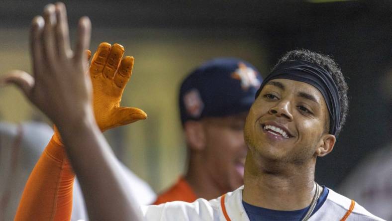 Jul 5, 2022; Houston, Texas, USA; Houston Astros shortstop Jeremy Pena (3) celebrates his home run in the dugout against the Kansas City Royals in the fifth inning at Minute Maid Park. Mandatory Credit: Thomas Shea-USA TODAY Sports