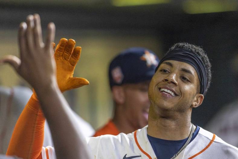 Jul 5, 2022; Houston, Texas, USA; Houston Astros shortstop Jeremy Pena (3) celebrates his home run in the dugout against the Kansas City Royals in the fifth inning at Minute Maid Park. Mandatory Credit: Thomas Shea-USA TODAY Sports