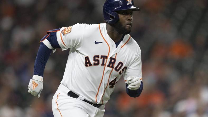 Jul 5, 2022; Houston, Texas, USA; Houston Astros left fielder Yordan Alvarez (44) hits a single against the Kansas City Royals in the fifth inning at Minute Maid Park. Mandatory Credit: Thomas Shea-USA TODAY Sports