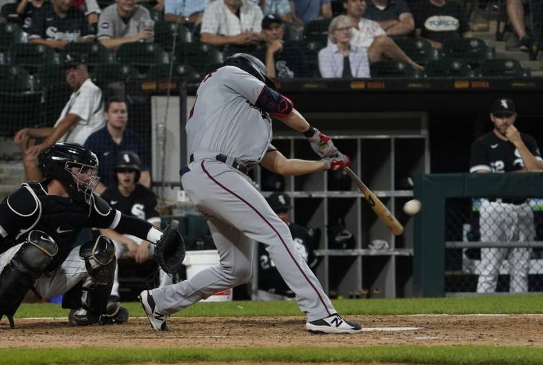 Jul 5, 2022; Chicago, Illinois, USA; Minnesota Twins left fielder Alex Kirilloff (19)hits a two run home run against the Chicago White Sox during the seventh inning at Guaranteed Rate Field. Mandatory Credit: David Banks-USA TODAY Sports