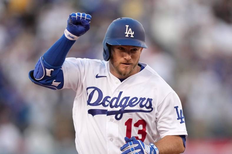 Jul 5, 2022; Los Angeles, California, USA; Los Angeles Dodgers third baseman Max Muncy (13) celebrates after hitting a two-run home run in the second inning against the Colorado Rockies at Dodger Stadium. Mandatory Credit: Kirby Lee-USA TODAY Sports