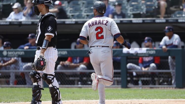 Jul 6, 2022; Chicago, Illinois, USA; Minnesota Twins first baseman Luis Arraez (2) scores against the Chicago White Sox during the first inning at Guaranteed Rate Field. Mandatory Credit: Kamil Krzaczynski-USA TODAY Sports