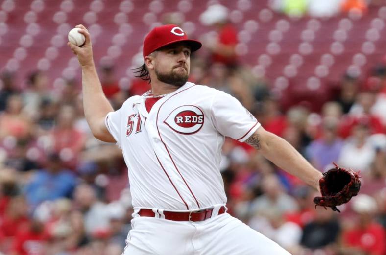 Jul 6, 2022; Cincinnati, Ohio, USA; Cincinnati Reds starting pitcher Graham Ashcraft (51) throws a pitch against the New York Mets during the first inning at Great American Ball Park. Mandatory Credit: David Kohl-USA TODAY Sports