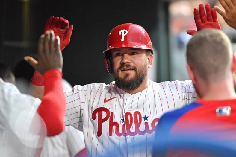 Jul 6, 2022; Philadelphia, Pennsylvania, USA; Philadelphia Phillies left fielder Kyle Schwarber (12) celebrates his home run in the dugout during the fourth inning against the Washington Nationals at Citizens Bank Park. Mandatory Credit: Eric Hartline-USA TODAY Sports