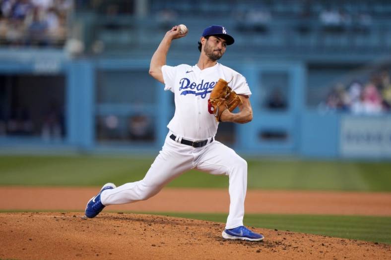 Jul 6, 2022; Los Angeles, California, USA; Los Angeles Dodgers starting pitcher Mitch White (66) throws a pitch in the third inning against the Colorado Rockies at Dodger Stadium. Mandatory Credit: Kirby Lee-USA TODAY Sports