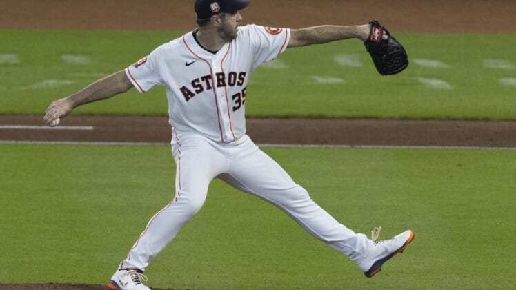 Jul 7, 2022; Houston, Texas, USA;  Houston Astros starting pitcher Justin Verlander (35) pitches against the Kansas City Royals in the fifth inning at Toyota Center. Mandatory Credit: Thomas Shea-USA TODAY Sports