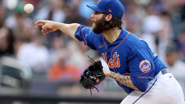 Jul 7, 2022; New York City, New York, USA; New York Mets starting pitcher Trevor Williams (29) pitches against the Miami Marlins during the first inning at Citi Field. Mandatory Credit: Brad Penner-USA TODAY Sports