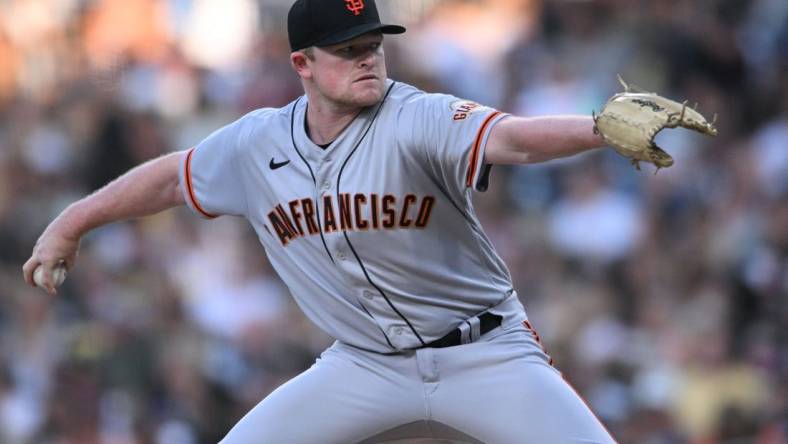 Jul 7, 2022; San Diego, California, USA; San Francisco Giants starting pitcher Logan Webb (62) throws a pitch against the San Diego Padres during the first inning at Petco Park. Mandatory Credit: Orlando Ramirez-USA TODAY Sports