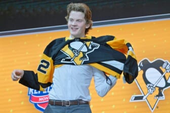 Jul 7, 2022; Montreal, Quebec, CANADA; Owen Pickering after being selected as the No. 21 overall pick to the Pittsburgh Penguins in the first round of the 2022 NHL Draft at Bell Centre. Mandatory Credit: Eric Bolte-USA TODAY Sports