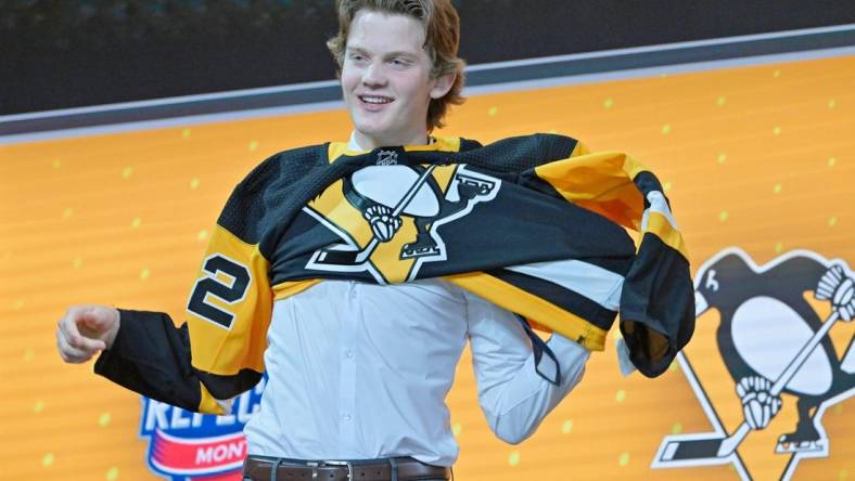 Jul 7, 2022; Montreal, Quebec, CANADA; Owen Pickering after being selected as the No. 21 overall pick to the Pittsburgh Penguins in the first round of the 2022 NHL Draft at Bell Centre. Mandatory Credit: Eric Bolte-USA TODAY Sports