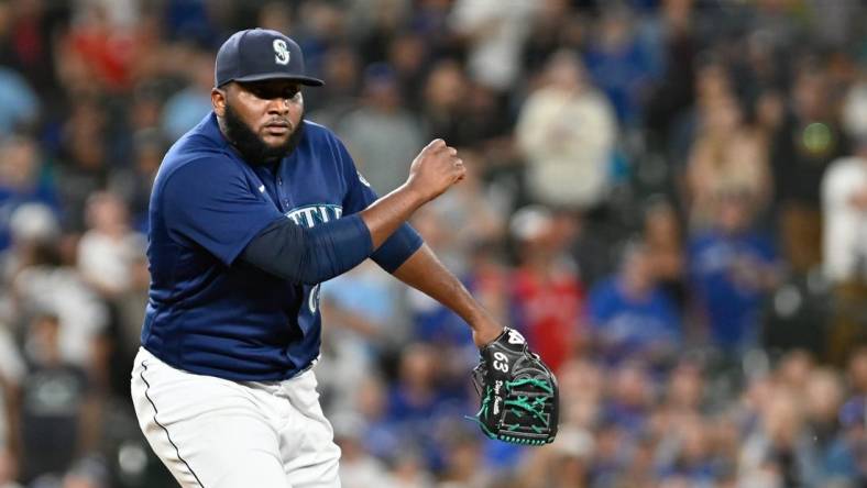 Jul 7, 2022; Seattle, Washington, USA; Seattle Mariners relief pitcher Diego Castillo celebrates after the Mariners get the final out of the game against the Toronto Blue Jays at T-Mobile Park. Seattle defeated Toronto 8-3. Mandatory Credit: Steven Bisig-USA TODAY Sports