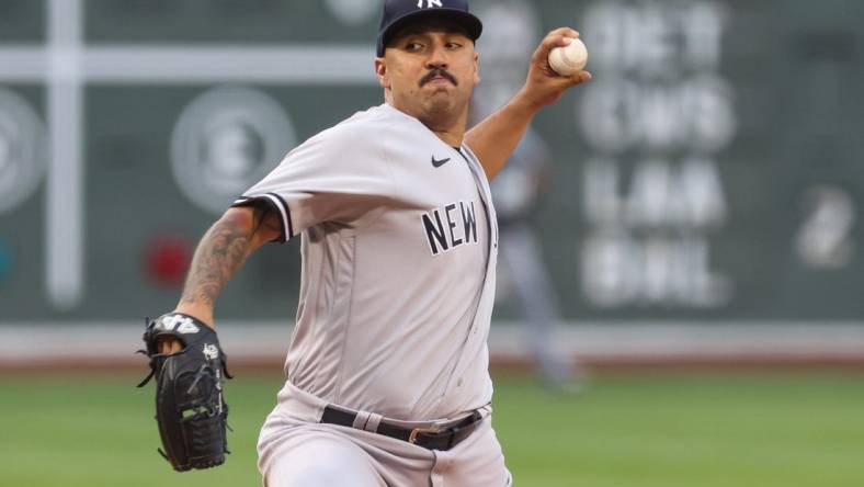 Jul 8, 2022; Boston, Massachusetts, USA; New York Yankees starting pitcher Nestor Cortes (65) throws a pitch against the Boston Red Sox during the first inning at Fenway Park. Mandatory Credit: Paul Rutherford-USA TODAY Sports