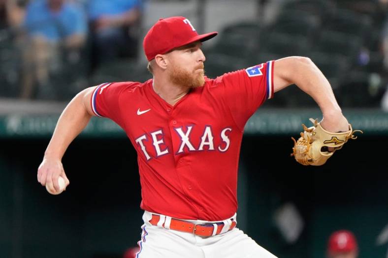 Jul 8, 2022; Arlington, Texas, USA; Texas Rangers starting pitcher Jon Gray (22) delivers against the Minnesota Twins during the first inning at Globe Life Field. Mandatory Credit: Jim Cowsert-USA TODAY Sports