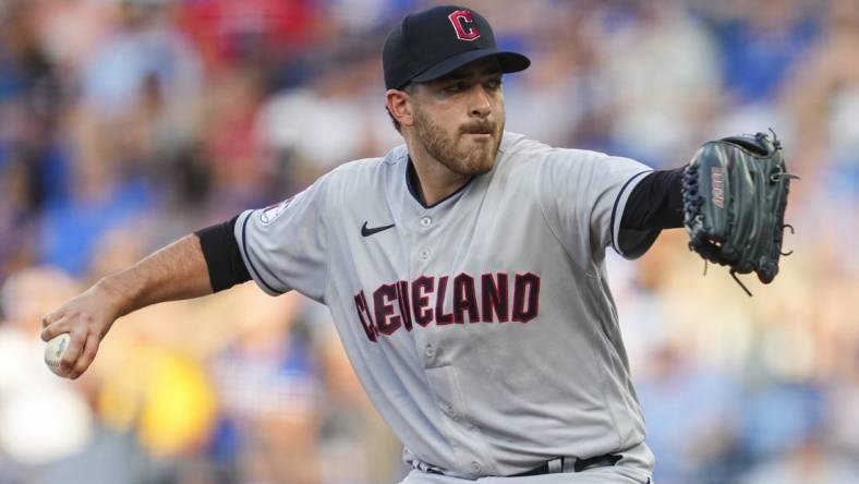 Jul 8, 2022; Kansas City, Missouri, USA; Cleveland Guardians starting pitcher Aaron Civale (43) throws against the Kansas City Royals during the first inning at Kauffman Stadium. Mandatory Credit: Jay Biggerstaff-USA TODAY Sports