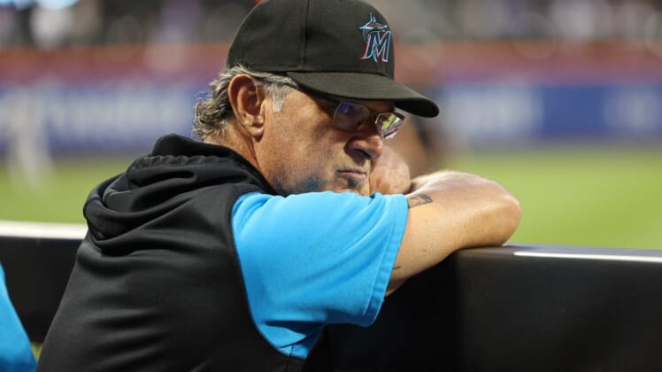 Jul 8, 2022; New York City, New York, USA;  Miami Marlins manager Don Mattingly (8) watches game action during the third inning against the New York Mets at Citi Field. Mandatory Credit: Vincent Carchietta-USA TODAY Sports