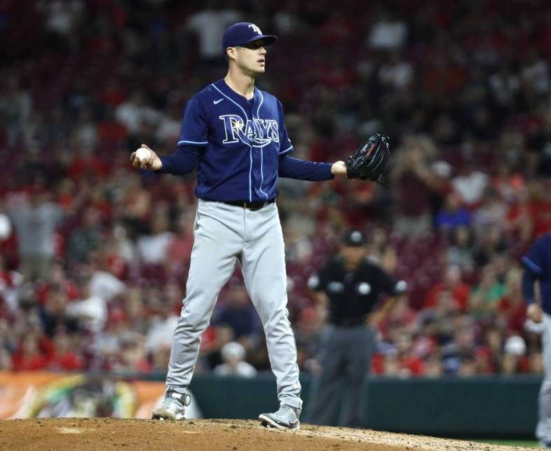 Jul 8, 2022; Cincinnati, Ohio, USA; Tampa Bay Rays relief pitcher Matt Wisler (37) reacts being called for a balk that led to giving up the winning run to the Cincinnati Reds in the tenth inning at Great American Ball Park. Mandatory Credit: David Kohl-USA TODAY Sports