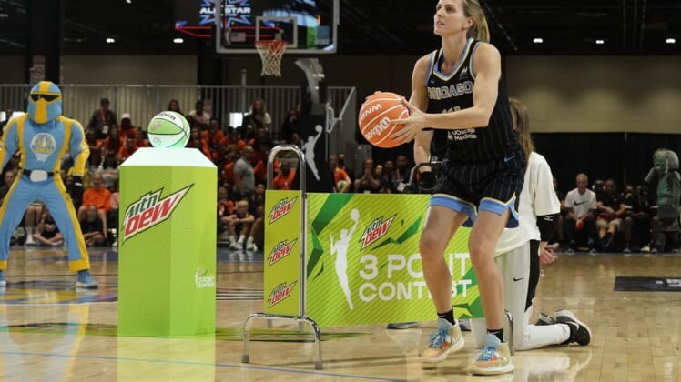 Jul 9, 2022; Chicago, Ill, USA; Allie Quigley shoots 3-point baskets during the 2022 WNBA All-Star Game skills competition at Wintrust Arena. Mandatory Credit: David Banks-USA TODAY Sports