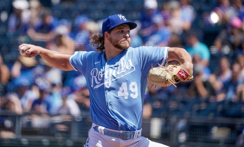 Jul 9, 2022; Kansas City, Missouri, USA; Kansas City Royals starting pitcher Jonathan Heasley (49) delivers a pitch against the Cleveland Guardians in the first inning at Kauffman Stadium. Mandatory Credit: Denny Medley-USA TODAY Sports
