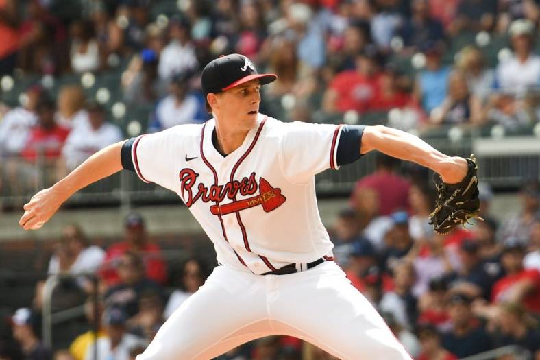 Jul 9, 2022; Cumberland, Georgia, USA; Atlanta Braves starting pitcher Kyle Wright (30) throws a pitch against the Washington Nationals at Truist Park. Mandatory Credit: Larry Robinson-USA TODAY Sports