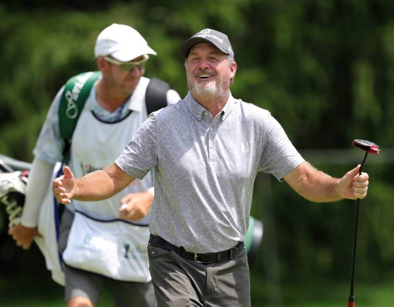 Jerry Kelly laughs as his putt fails to fall into the 15th hole during third round of the Bridgestone Senior Players Championship at Firestone Country Club on Saturday.

Bridgestone 4