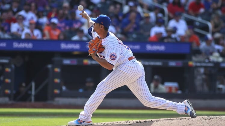 Jul 9, 2022; New York City, New York, USA;  New York Mets starting pitcher Carlos Carrasco (59) pitches in the second inning against the Miami Marlins at Citi Field. Mandatory Credit: Wendell Cruz-USA TODAY Sports