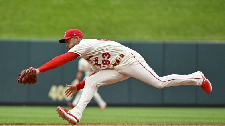 Jul 9, 2022; St. Louis, Missouri, USA;  St. Louis Cardinals shortstop Edmundo Sosa (63) catches a line drive against the Philadelphia Phillies during the eighth inning at Busch Stadium. Mandatory Credit: Jeff Curry-USA TODAY Sports