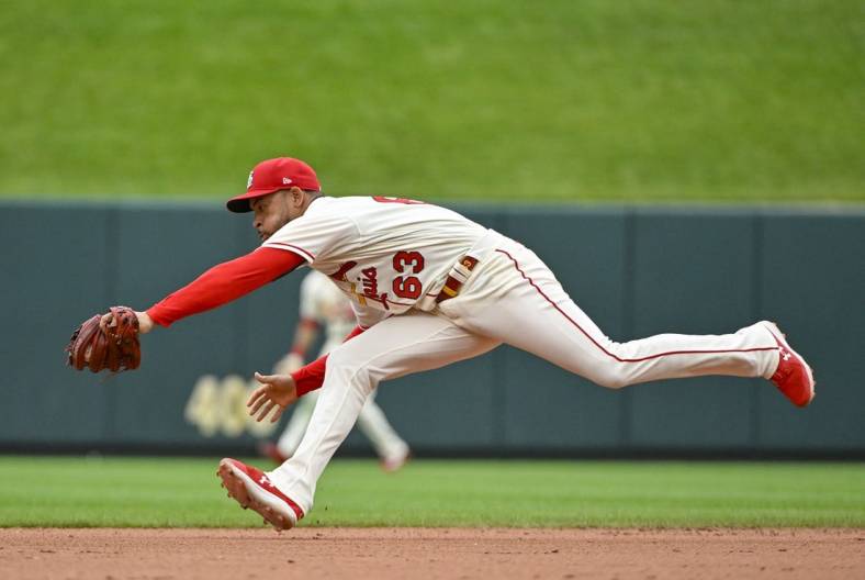Jul 9, 2022; St. Louis, Missouri, USA;  St. Louis Cardinals shortstop Edmundo Sosa (63) catches a line drive against the Philadelphia Phillies during the eighth inning at Busch Stadium. Mandatory Credit: Jeff Curry-USA TODAY Sports