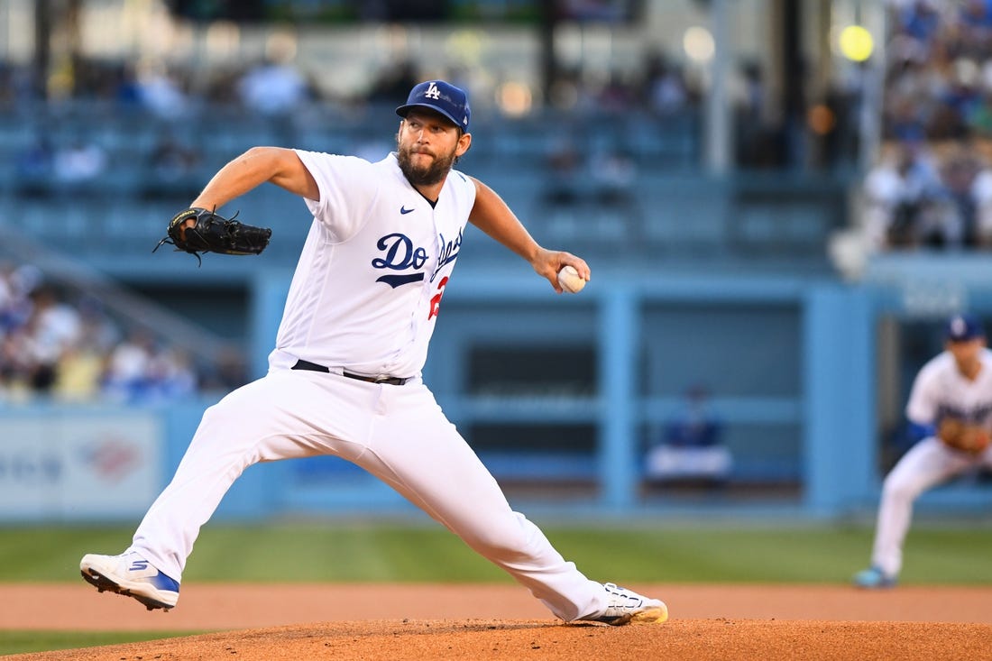 Jul 9, 2022; Los Angeles, California, USA; Los Angeles Dodgers starting pitcher Clayton Kershaw (22) pitches against the Chicago Cubs during the first inning at Dodger Stadium. Mandatory Credit: Jonathan Hui-USA TODAY Sports