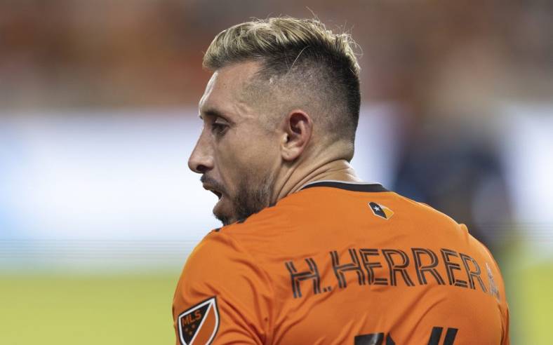 Jul 9, 2022; Houston, Texas, USA; Houston Dynamo midfielder Hector Herrera (16) after a water break against the FC Dallas in the second half at PNC Stadium. Mandatory Credit: Thomas B. Shea-USA TODAY Sports