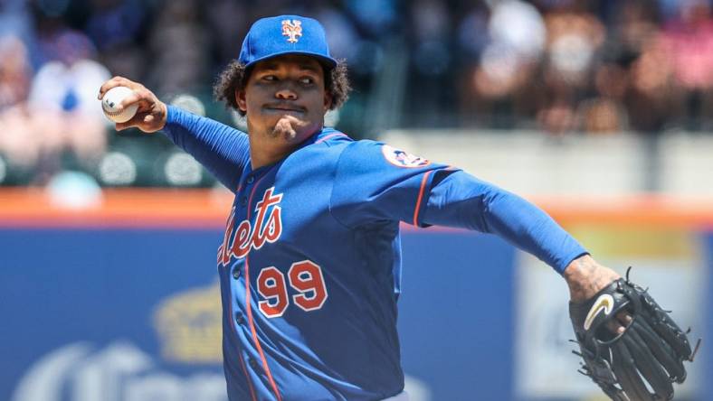 Jul 10, 2022; New York City, New York, USA; New York Mets starting pitcher Taijuan Walker (99) delivers a pitch during the first inning against the Miami Marlins at Citi Field. Mandatory Credit: Vincent Carchietta-USA TODAY Sports