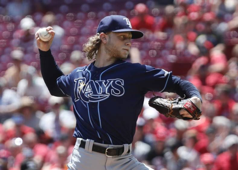 Jul 10, 2022; Cincinnati, Ohio, USA; Tampa Bay Rays starting pitcher Shane Baz (11) throws a pitch against the Cincinnati Reds during the first inning at Great American Ball Park. Mandatory Credit: David Kohl-USA TODAY Sports