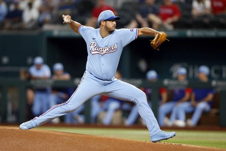 Jul 10, 2022; Arlington, Texas, USA; Texas Rangers starting pitcher Dane Dunning (33) throws a pitch against the Minnesota Twins in the first inning at Globe Life Field. Mandatory Credit: Tim Heitman-USA TODAY Sports