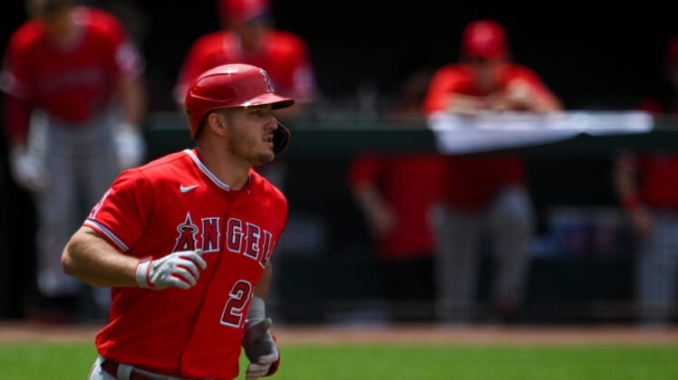 Jul 10, 2022; Baltimore, Maryland, USA;  Los Angeles Angels center fielder Mike Trout (27) runs out a eighth inning single against the Baltimore Orioles at Oriole Park at Camden Yards. Mandatory Credit: Tommy Gilligan-USA TODAY Sports