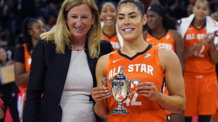 Jul 10, 2022; Chicago, Ill, USA; WNBA commissioner Cathy Engelbert presents the WNBA All Star Game MVP Award to Team Wilson guard Kelsey Plum at Wintrust Arena. Mandatory Credit: David Banks-USA TODAY Sports