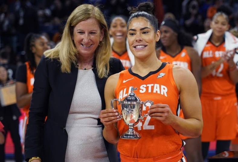 Jul 10, 2022; Chicago, Ill, USA; WNBA commissioner Cathy Engelbert presents the WNBA All Star Game MVP Award to Team Wilson guard Kelsey Plum at Wintrust Arena. Mandatory Credit: David Banks-USA TODAY Sports