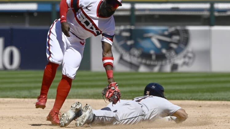 Jul 10, 2022; Chicago, Illinois, USA;  Chicago White Sox second baseman Josh Harrison (5) tags out Detroit Tigers center fielder Riley Greene (31) on an attempted steal during the third inning at Guaranteed Rate Field. Mandatory Credit: Matt Marton-USA TODAY Sports