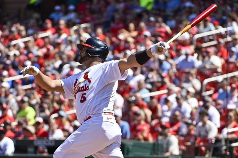 Jul 10, 2022; St. Louis, Missouri, USA;  St. Louis Cardinals first baseman Albert Pujols (5) hits a solo home run against the Philadelphia Phillies during the sixth inning at Busch Stadium. Mandatory Credit: Jeff Curry-USA TODAY Sports