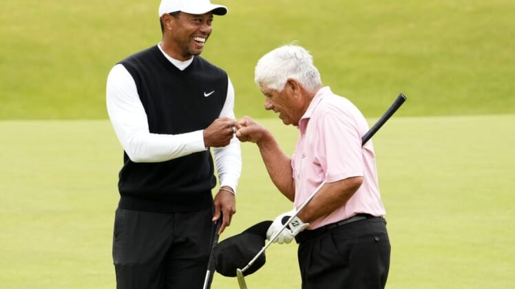 Jul 11, 2022; St. Andrews, SCT; Tiger Woods and Lee Trevino during the R&A Celebration of Champions four-hole challenge at the 150th Open Championship golf tournament at St. Andrews Old Course. Mandatory Credit: Rob Schumacher-USA TODAY Sports