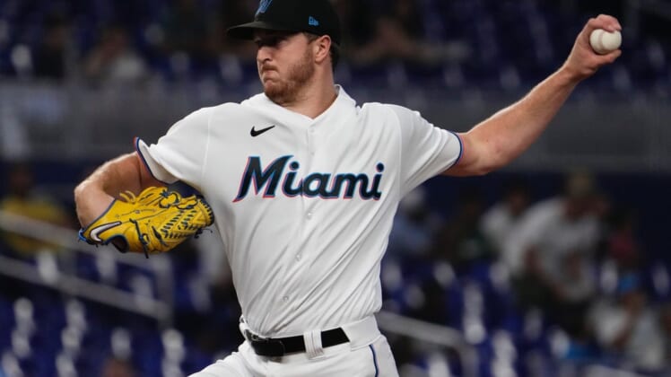 Jul 11, 2022; Miami, Florida, USA; Miami Marlins starting pitcher Trevor Rogers (28) delivers a pitch in the first inning against the Pittsburgh Pirates at loanDepot park. Mandatory Credit: Jasen Vinlove-USA TODAY Sports