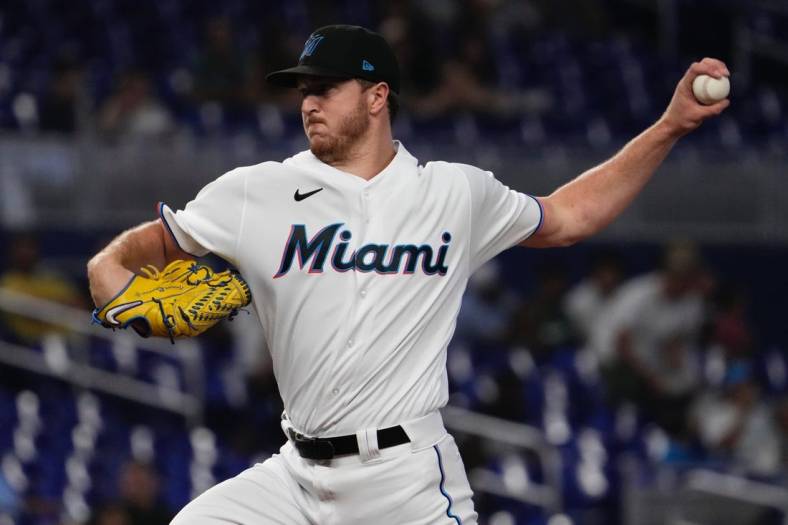 Jul 11, 2022; Miami, Florida, USA; Miami Marlins starting pitcher Trevor Rogers (28) delivers a pitch in the first inning against the Pittsburgh Pirates at loanDepot park. Mandatory Credit: Jasen Vinlove-USA TODAY Sports