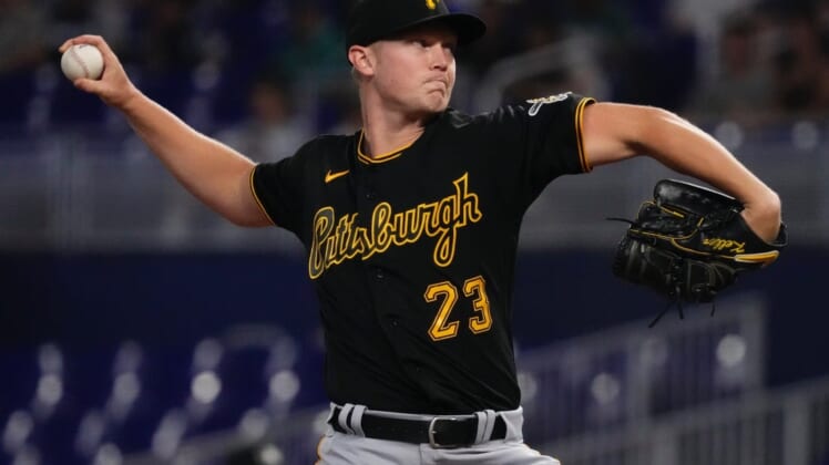 Jul 11, 2022; Miami, Florida, USA; Pittsburgh Pirates starting pitcher Mitch Keller (23) delivers a pitch in the first inning against the Miami Marlins at loanDepot park. Mandatory Credit: Jasen Vinlove-USA TODAY Sports