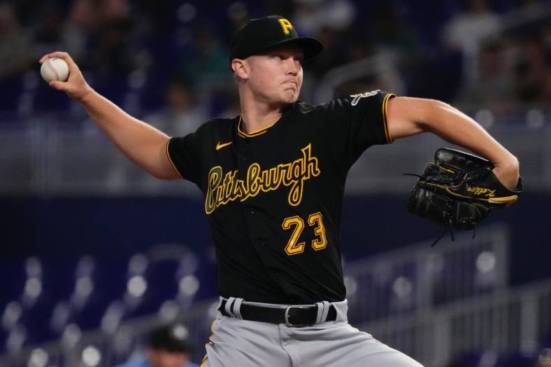 Jul 11, 2022; Miami, Florida, USA; Pittsburgh Pirates starting pitcher Mitch Keller (23) delivers a pitch in the first inning against the Miami Marlins at loanDepot park. Mandatory Credit: Jasen Vinlove-USA TODAY Sports