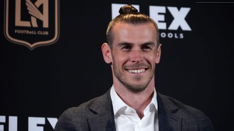 Jul 11, 2022; Los Angeles, CA, USA; LAFC forward Gareth Bale reacts during introductory press conference at Banc of California Stadium. Mandatory Credit: Kirby Lee-USA TODAY Sports